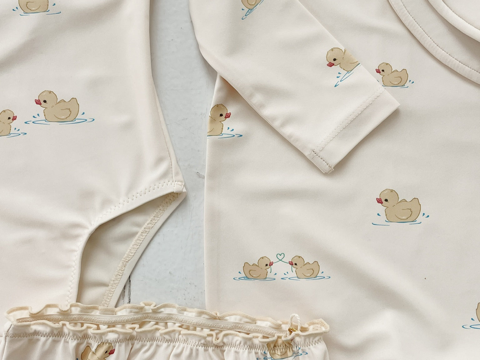 Konges Sløjd A/S UV ONESIES fanga mio